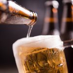 glass-bottles-beer-with-glass-ice-dark-background (1)